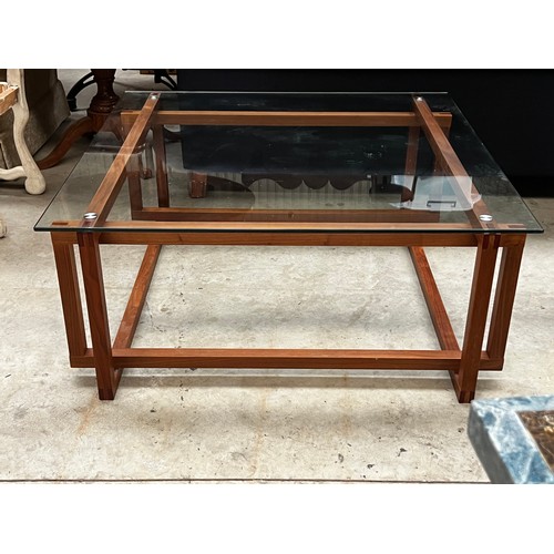 602 - Modern as new glass topped coffee table, approx 105cm Sq x 45cm H