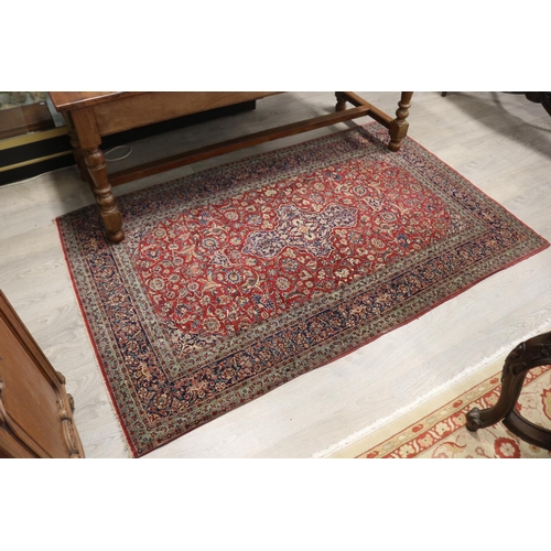 620 - Vintage Persian silk carpet, of predominately red ground, with all over floral pattern, approx 142cm... 