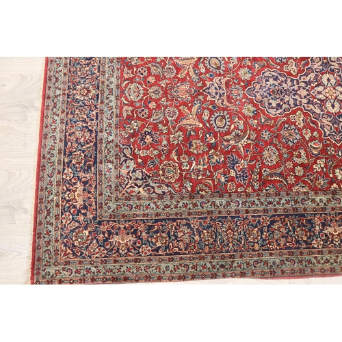 620 - Vintage Persian silk carpet, of predominately red ground, with all over floral pattern, approx 142cm... 