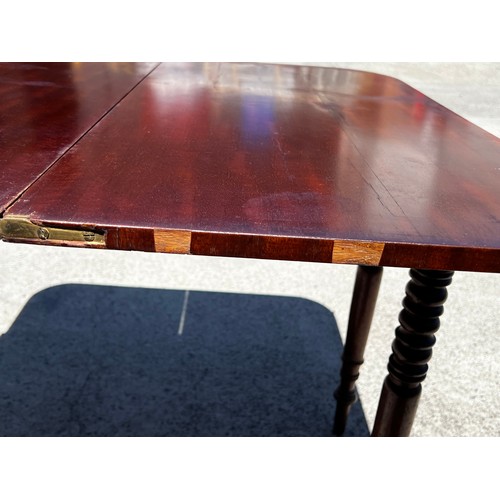 652 - Antique late Regency mahogany fold over tea table, standing on multi ring turned legs, approx 76cm H... 