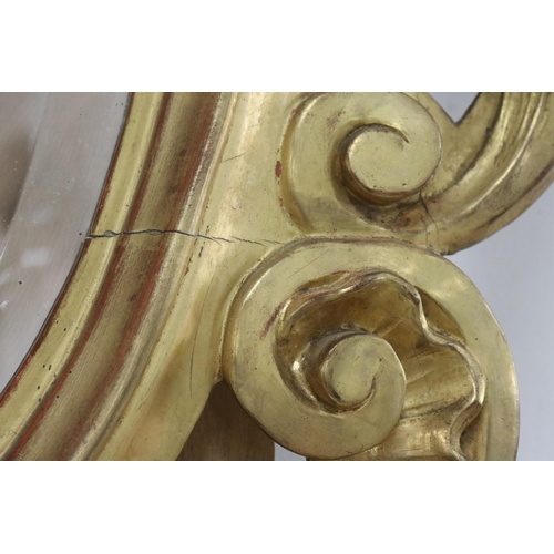 28 - Antique 19th century French true gilt wood mirror, pierced C scroll & leaf surround, approx 151cm H ... 