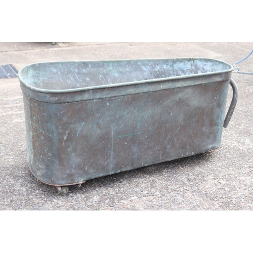 40 - Antique French copper bath on castors, approx 64cm H x 132cm L x 59cm W