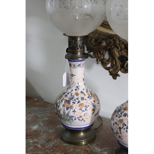 55 - Pair of antique French faience pottery oil lamps, with etched glass shades, each approx 59cm H (2)