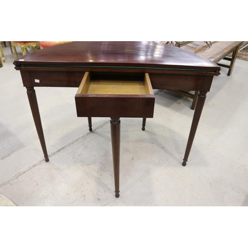 57 - Antique French mahogany D end fold over games table, with brass banded trim, standing on turned tape... 