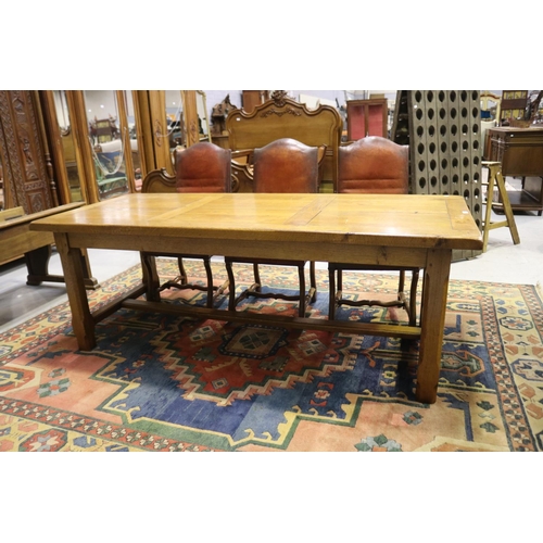 60 - French oak refectory table, standing on chamfered square legs joined by a central stretcher, approx ... 