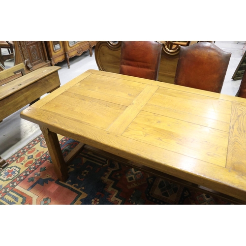60 - French oak refectory table, standing on chamfered square legs joined by a central stretcher, approx ... 