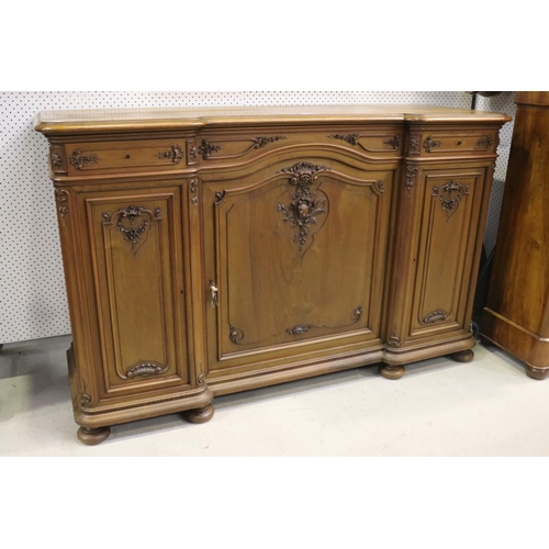 74 - Antique French inverted breakfront buffet, carved in low relief, two drawer and three doors below, a... 