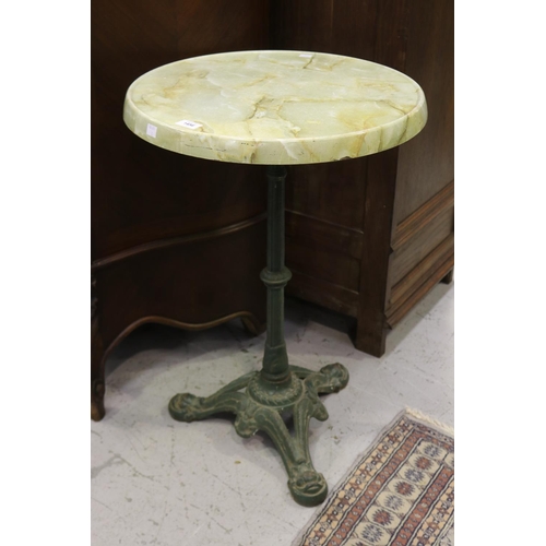 84 - French faux marble topped cast iron based bistro table, approx 74cm H x 49cm Dia