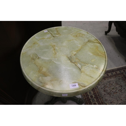 84 - French faux marble topped cast iron based bistro table, approx 74cm H x 49cm Dia