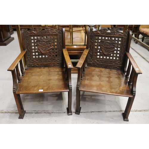 100 - Pair of early 20th century Chinese carved dragon arm chairs, each approx 79cm H x 51cm D x 55cm W (2... 