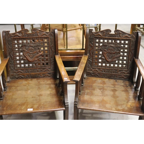 100 - Pair of early 20th century Chinese carved dragon arm chairs, each approx 79cm H x 51cm D x 55cm W (2... 