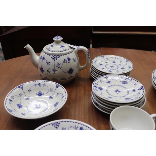 106 - Part Johnson Bros blue and white service to include teapot, plates, cups, saucers, etc, approx 28 pi... 
