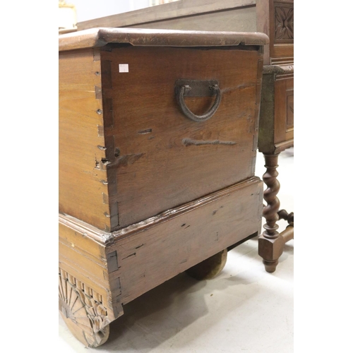 120 - Antique Indian teak Dowry chest, original iron hinges and locks, carry handles to the sides, carved ... 