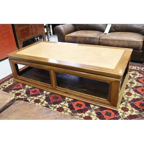 129 - Good quality large Oriental hardwood coffee table, with inset woven fibre top, approx 45cm H x 161cm... 