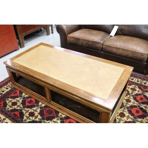129 - Good quality large Oriental hardwood coffee table, with inset woven fibre top, approx 45cm H x 161cm... 