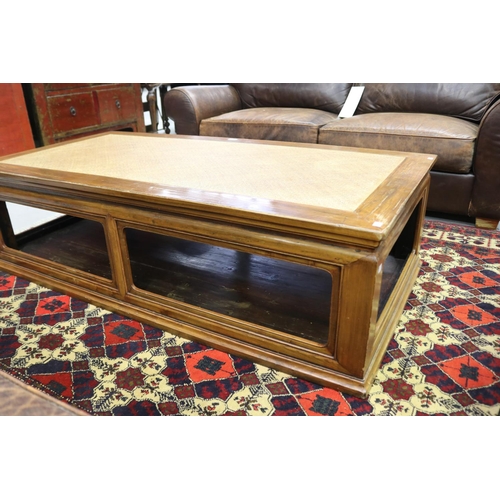 129 - Good quality large Oriental hardwood coffee table, with inset woven fibre top, approx 45cm H x 161cm... 