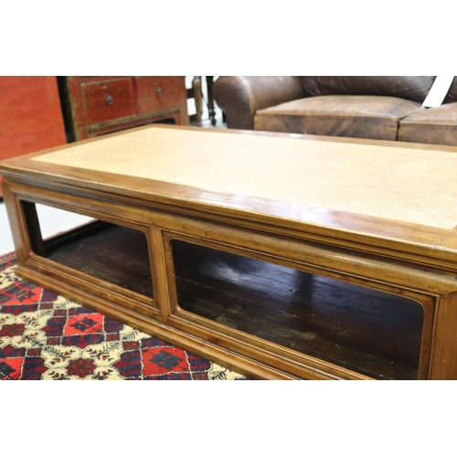 129 - Good quality large Oriental hardwood coffee table, with inset woven fibre top, approx 45cm H x 161cm... 