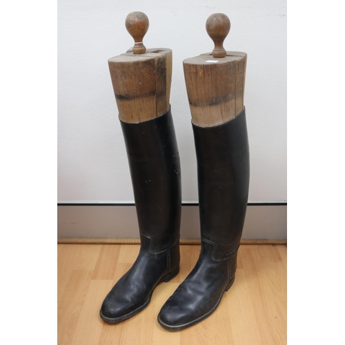 141 - Pair of large size antique French leather riding boots with wooden stretchers to each (2)