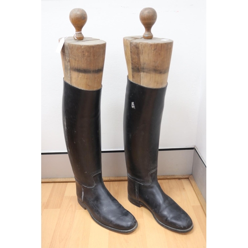 141 - Pair of large size antique French leather riding boots with wooden stretchers to each (2)
