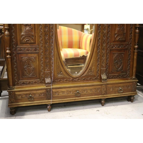 146 - Antique French Brittany three door armoire and three drawers below, carved in relief, approx 246cm H... 