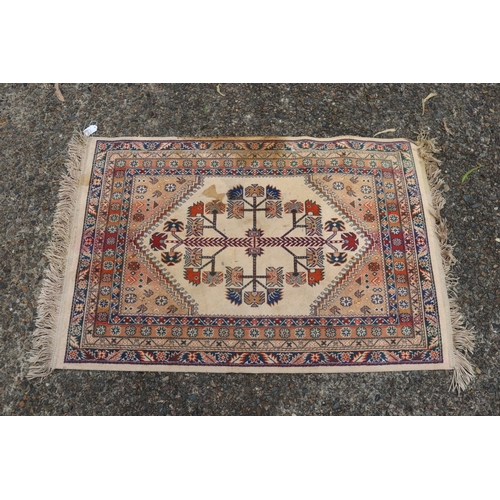 179 - Handwoven carpet, approx 103cm x 69cm