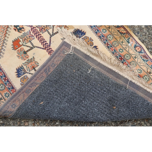 179 - Handwoven carpet, approx 103cm x 69cm