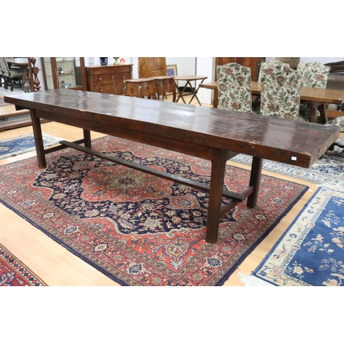 185 - Long antique style slab top trestle table, champhered square legs, with central stretcher, approx 76... 