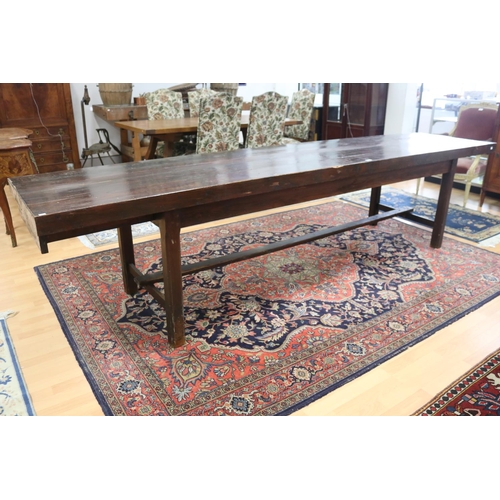 185 - Long antique style slab top trestle table, champhered square legs, with central stretcher, approx 76... 