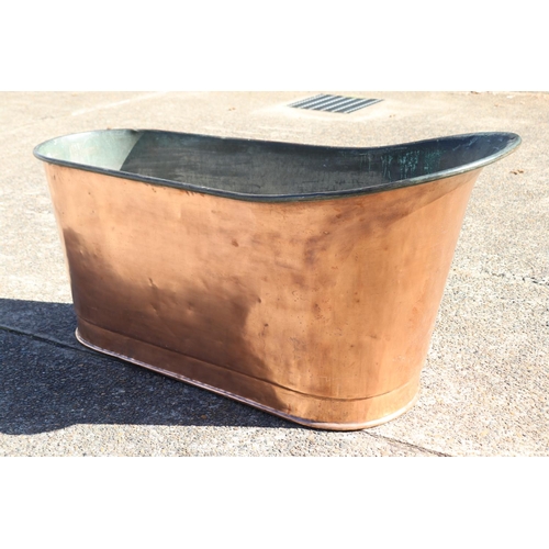 215 - Antique French copper bathtub of slipper form, in untouched original condition, approx 78cm H x 154c... 