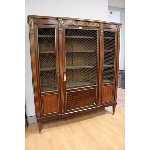 218 - J.D Seng of France - Fine antique French breakfront three door bookcase, fitted with gilt brass latt... 