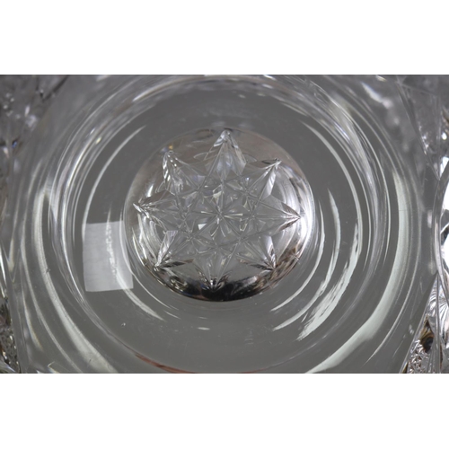 231 - Bohemia star cut crystal bowl on a heavy circular star and thumb cut base, approx 12cm H x 23cm dia