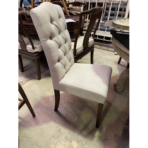 662 - Set of four cream deep buttoned high back dining chairs