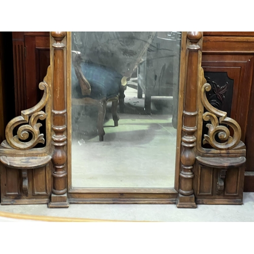 667 - Antique carved wood over mantle mirror, approx 131cm H x 110cm W