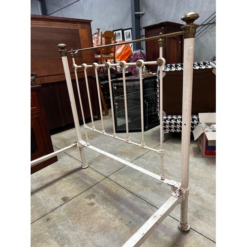 670 - Antique brass and iron double bed with spring base, including valance and quilt, approx 146cm H x 21... 