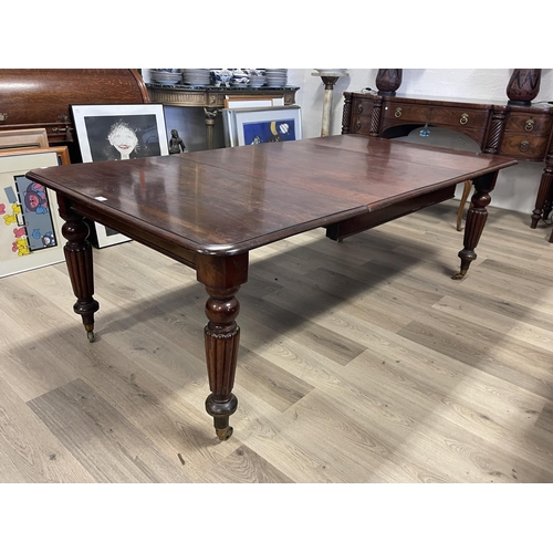 695 - Antique Victorian mahogany extension dining table, single large extra leaf standing on turned fluted... 