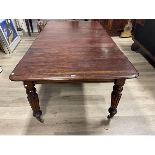 695 - Antique Victorian mahogany extension dining table, single large extra leaf standing on turned fluted... 