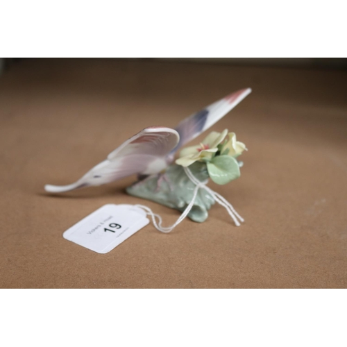 19 - Lladro porcelain butterfly on a branch, approx 6cm H x 9cm L