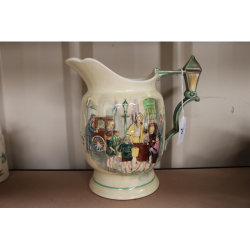 29 - A Crown Devon musical jug, Sally, Gracie Fields jug, approx 21cm H, working order