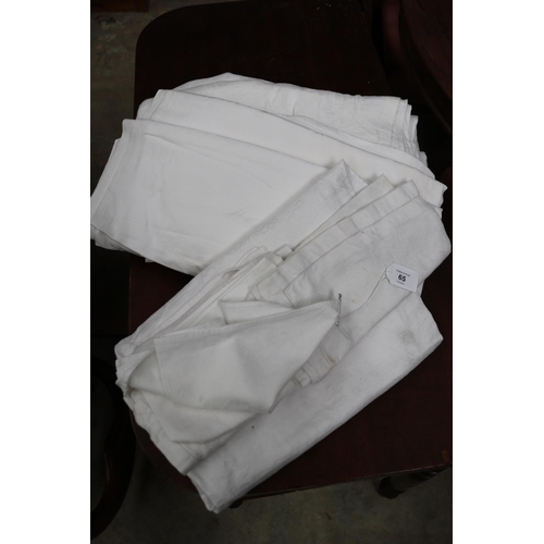 65 - Assortment of damask table cloths and similar napkins, sorry no measurements for this lot