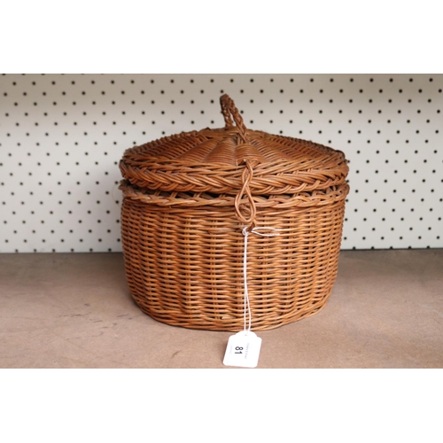 81 - Vintage cane sewing basket full of sewing items, approx 18cm H x 23cm Dia