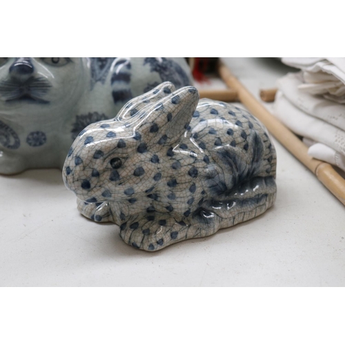 123 - Chinese blue and white cat and rabbit, approx 14cm H x 22cm L and smaller (2)