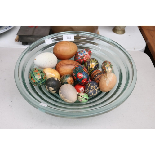 126 - Assortment of decorative eggs in a glass bowl, approx 10cm H x 35cm Dia and smaller