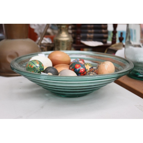 126 - Assortment of decorative eggs in a glass bowl, approx 10cm H x 35cm Dia and smaller