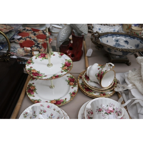 145 - Assortment of Royal Albert china, to include a tiered cake stand, sugar bowl, various cups and sauce... 
