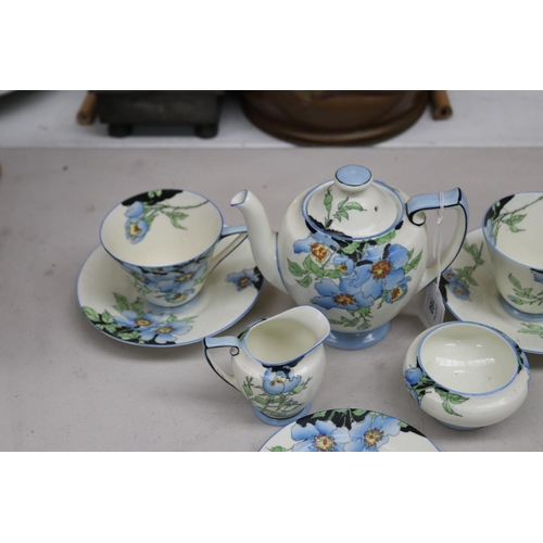 160 - Royal Doulton tête-à-tête comprising tea pot, two cups and saucers, sugar & creamer, pot stand