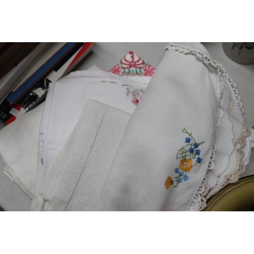 176 - Embroided cloths and doileys