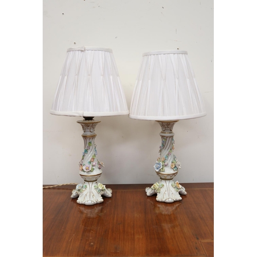 561 - Pair of German porcelain flower encrusted lamps, approx 48cm H each