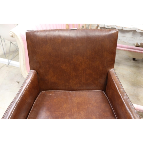 586 - Vintage faux brown leather studded trim arm chair