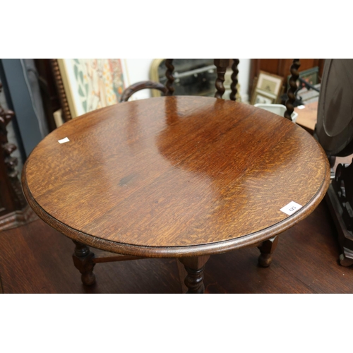 623 - 1920's English oak circular low table, approx 43cm H x 69 cm dia