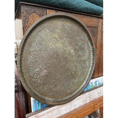 710 - Large circular Turkish worked brass coffee table tray, approx 56 cm dia